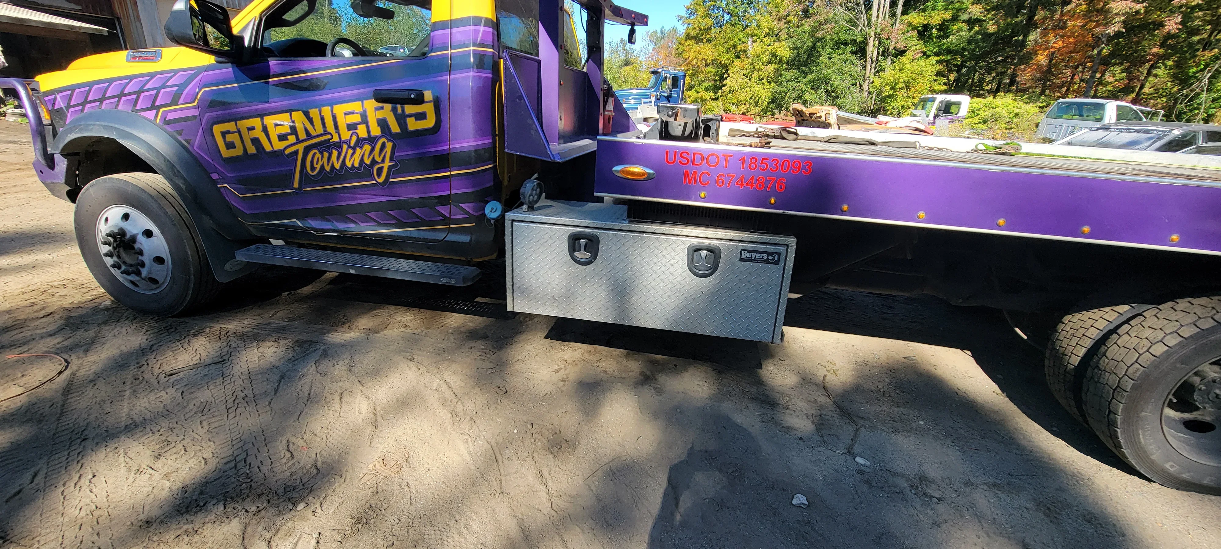 Grenier's Towing Flatbed Truck