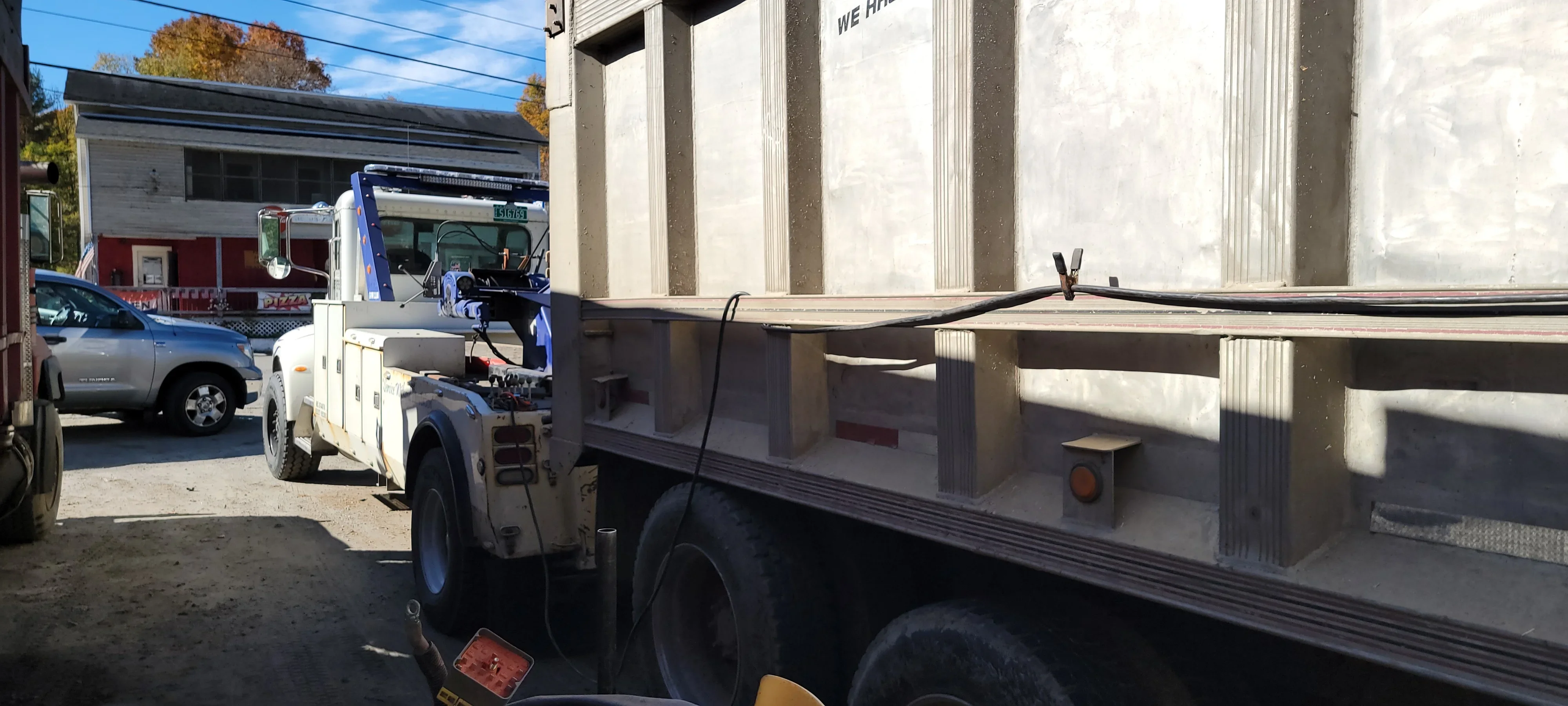 Tow Truck and Dump Trailer