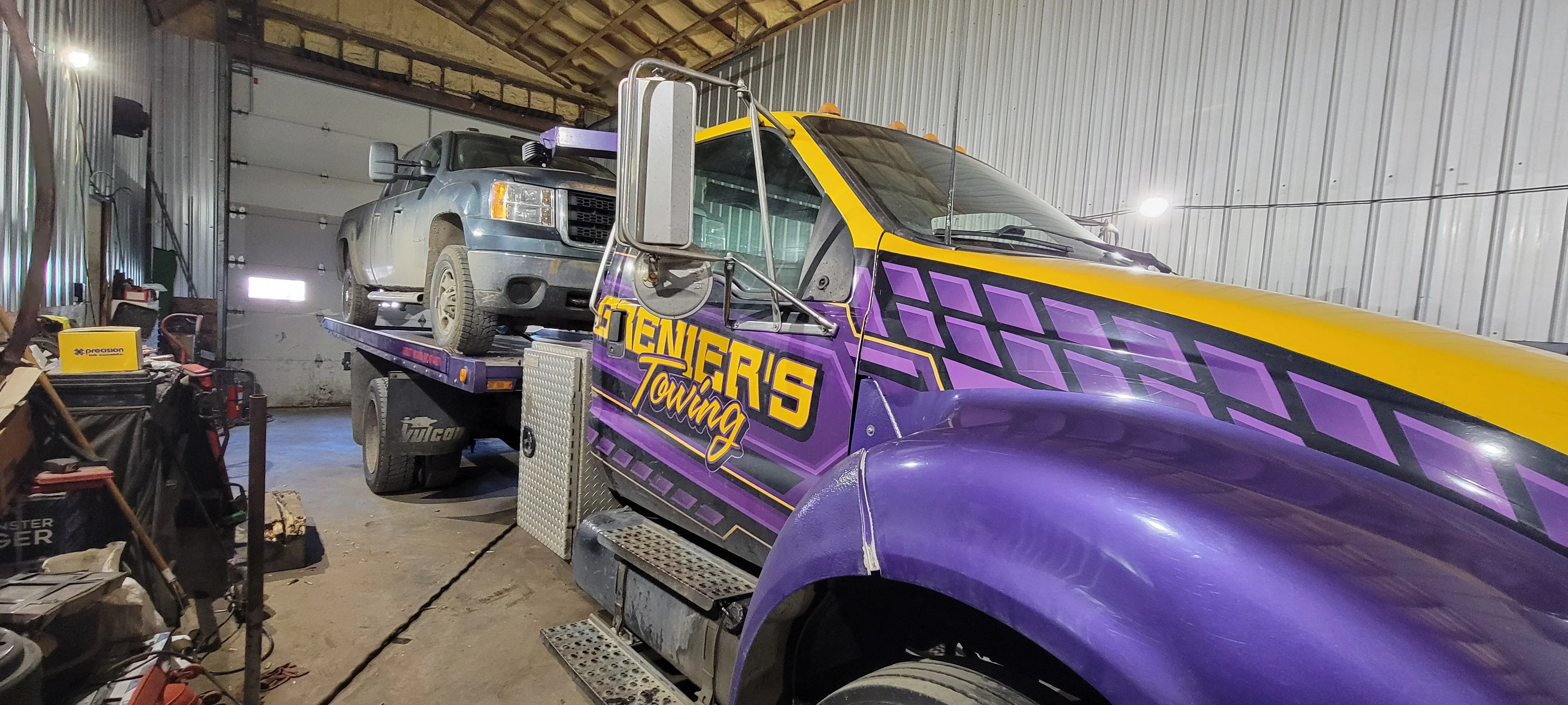 Tow Truck Transporting Pickup