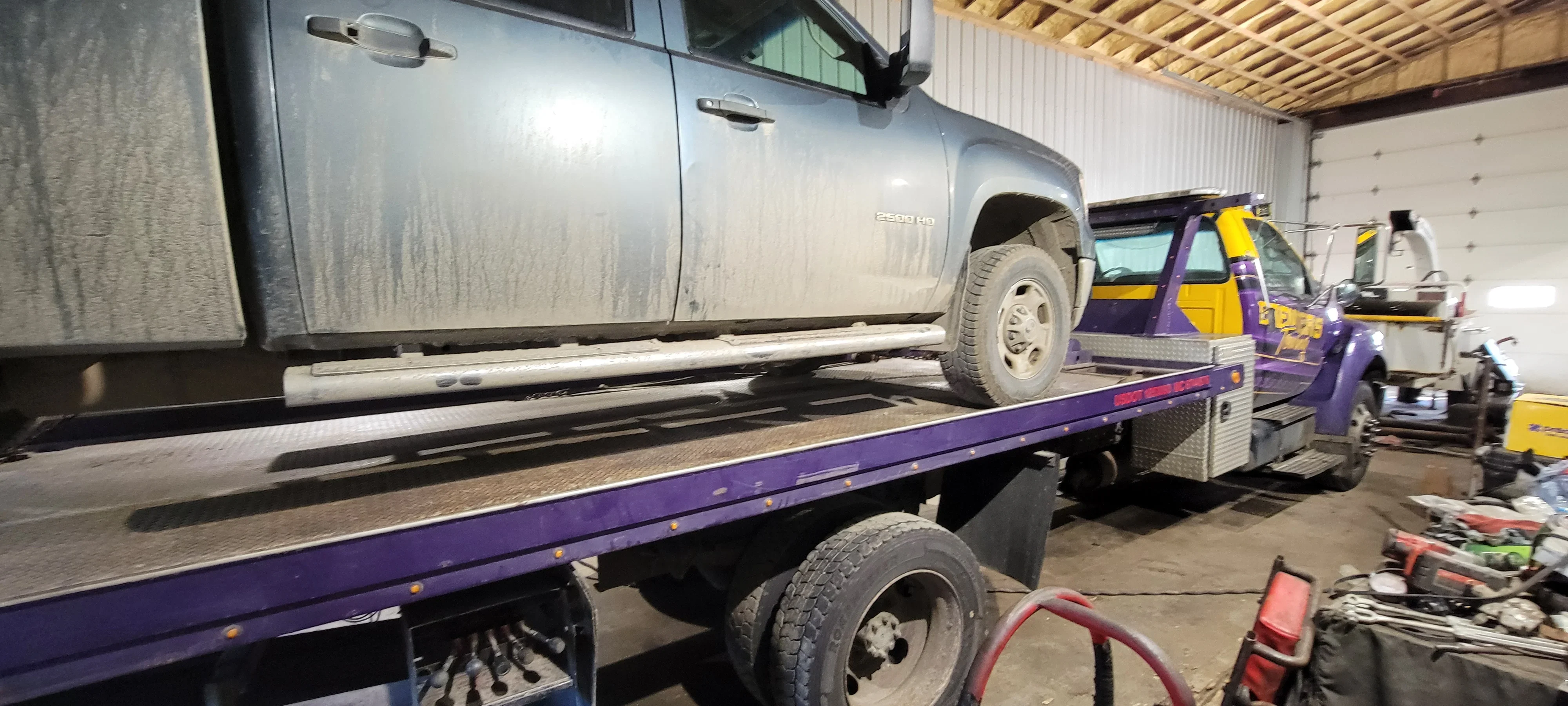 Tow Truck Transporting Pickup