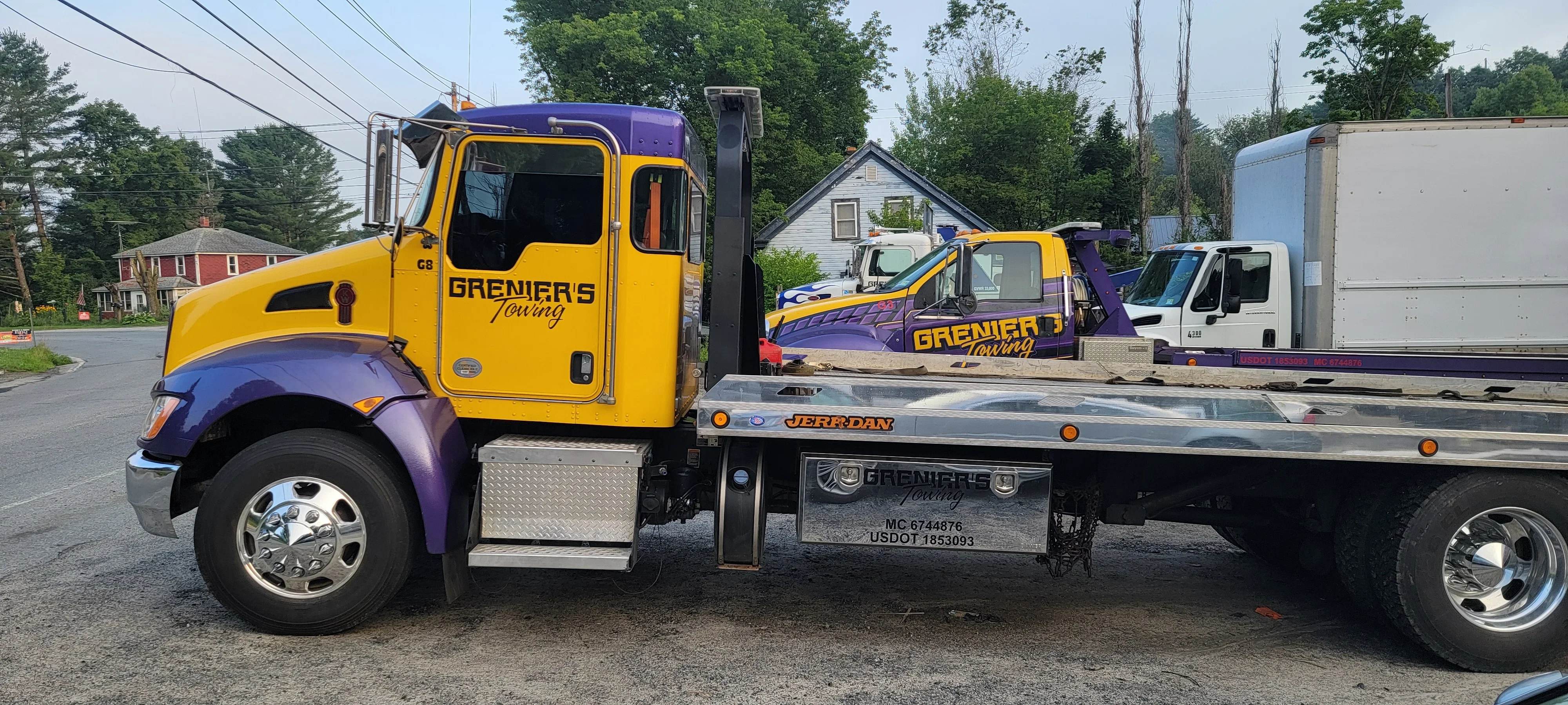 Grenier's Towing Flatbed Truck