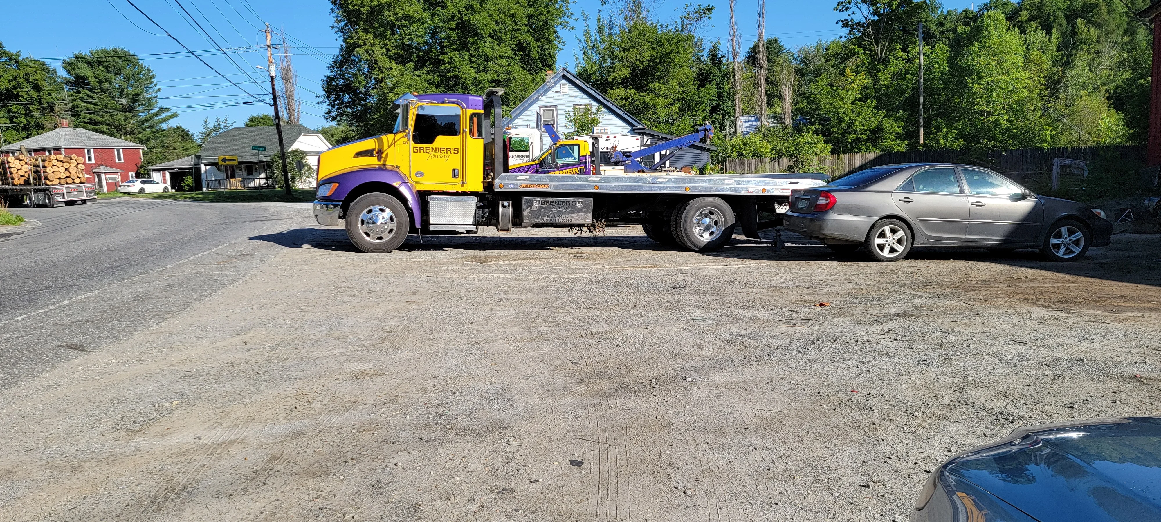 Flatbed Tow Truck Towing Sedan