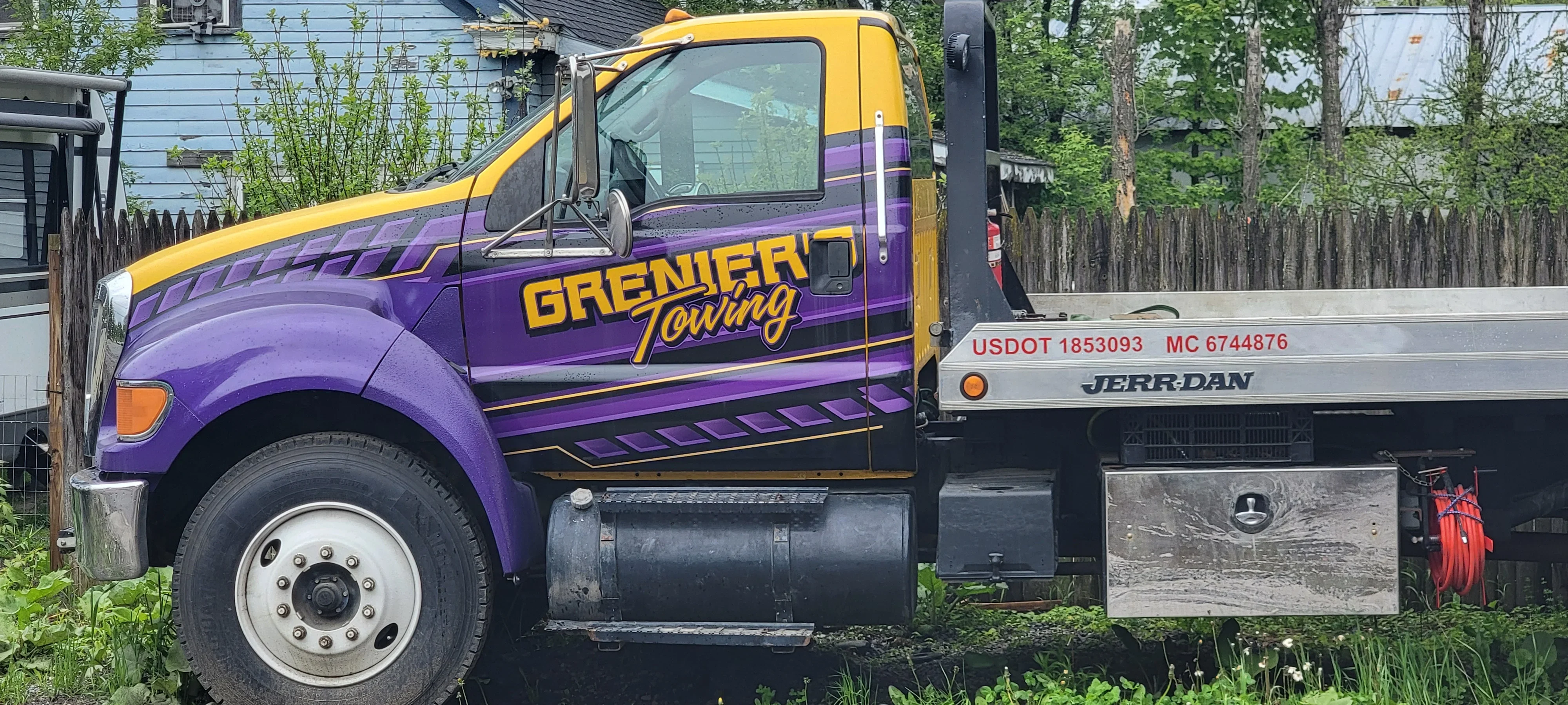 Grenier's Towing Flatbed Truck