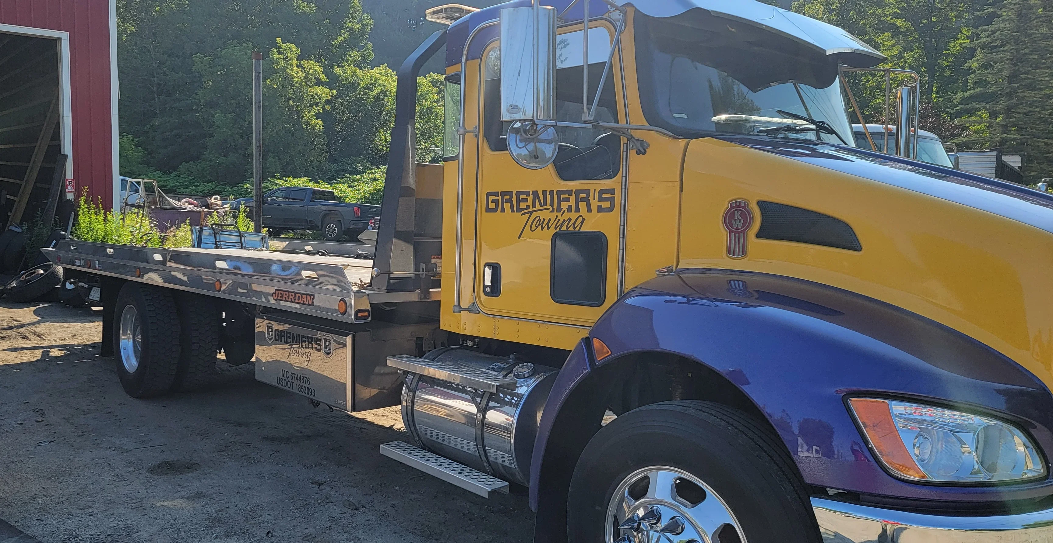 Grenier's Towing Flatbed Truck