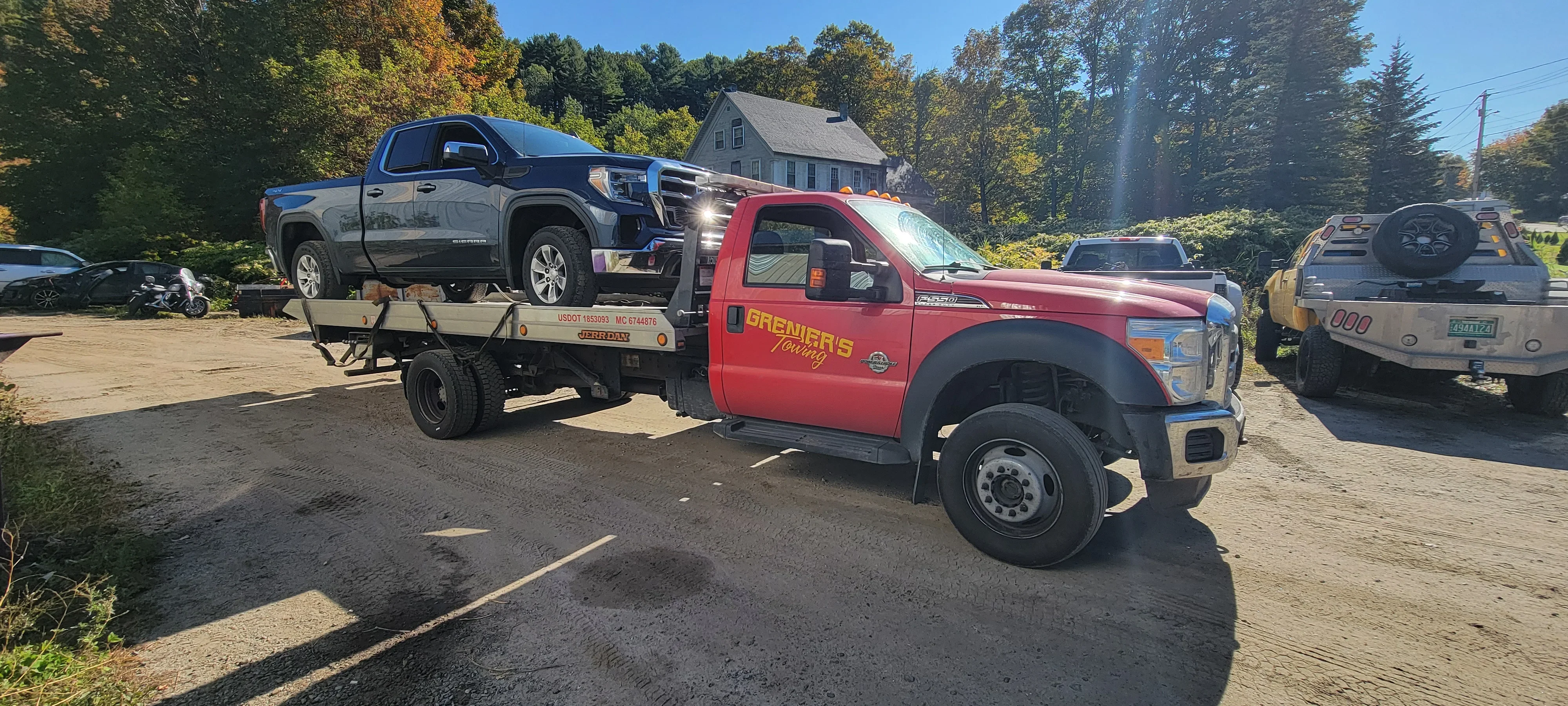 Tow Truck Transporting Pickup