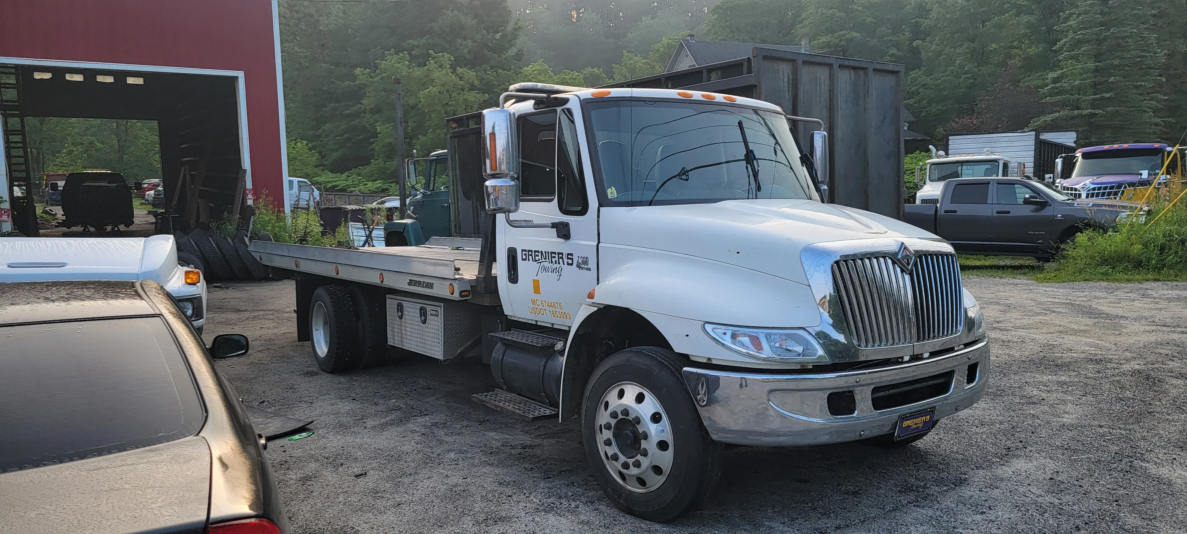 White Flatbed Tow Truck